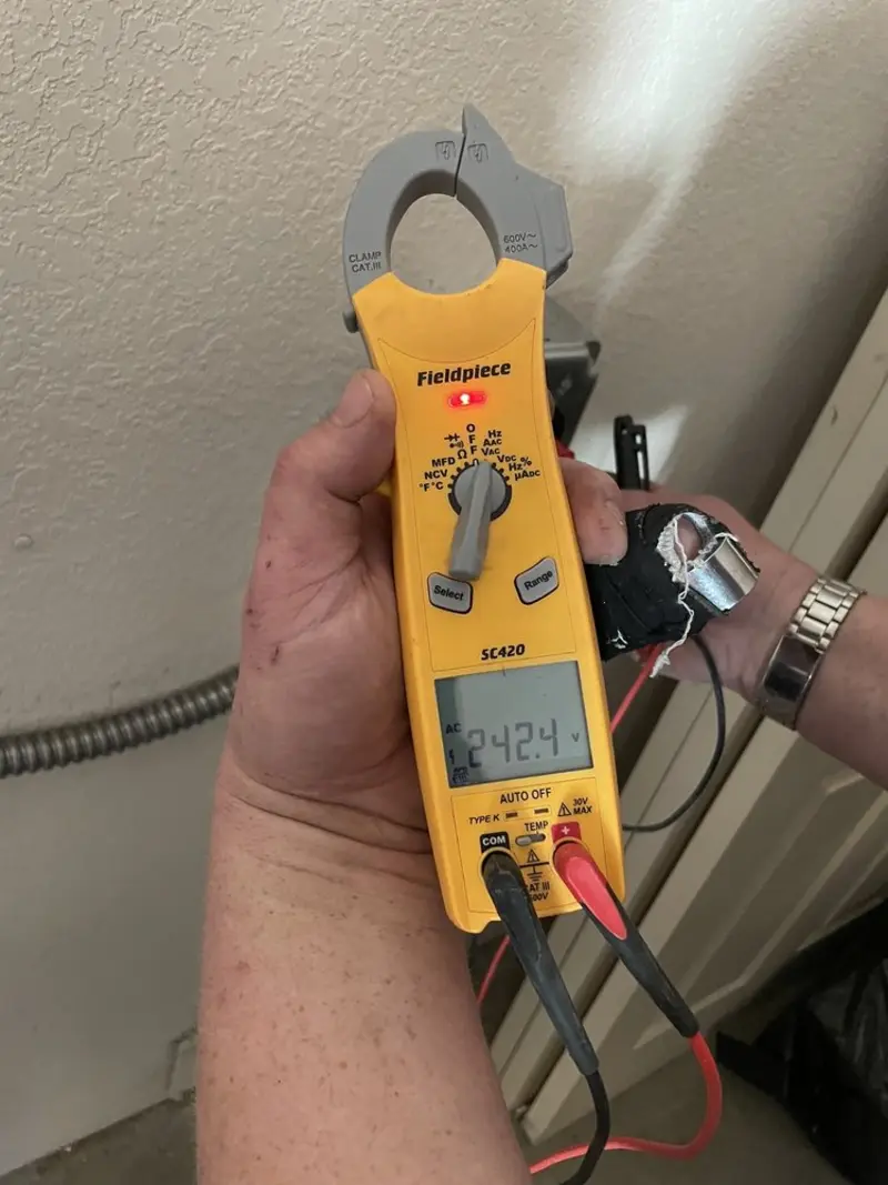 Voltage testing with clamp meter during Generator Installation in Marianna